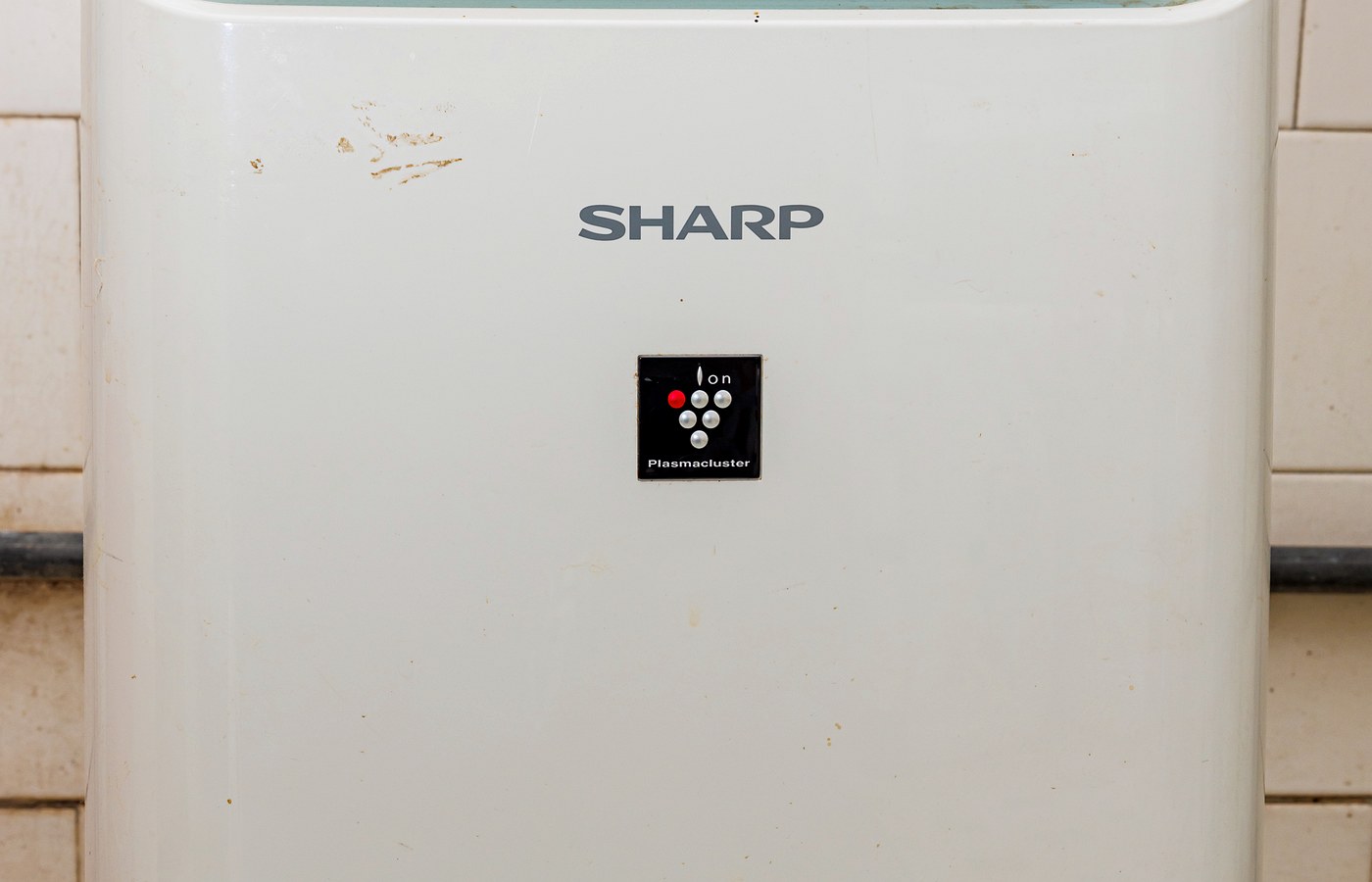 Real photo of sharp dehumidifier front side for Dehumidifier size guide for flats and small houses