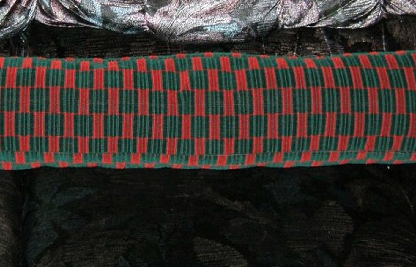Real photo of draught excluder photo for Heated throw buying guide for UK winter evenings