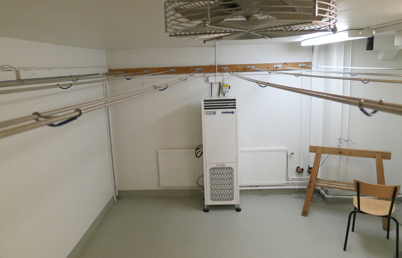 Real photo of condominium drying room for laundry for Laundry drying indoors: ventilation and moisture checklist
